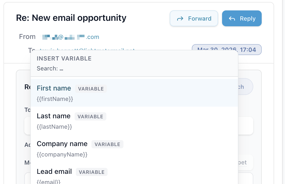 Reply composer showing the insert variable picker with slash-key shortcuts such as first name, last name, and company name